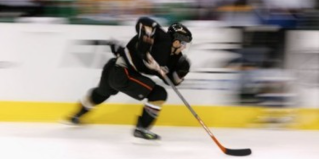 Image of hockey player skating.